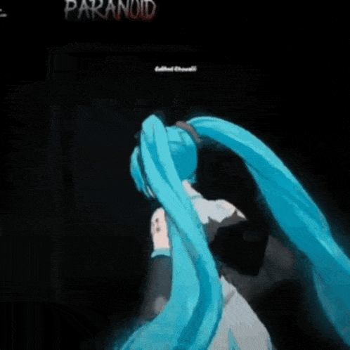 a person in a blue shirt is standing in front of a sign that says `` paranoid '' .