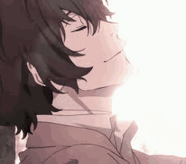 a close up of a person with their eyes closed and a light shining on their face .