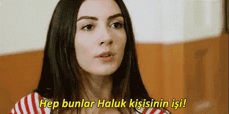 a close up of a woman 's face with the words hep bunlar haluk kisinin isi