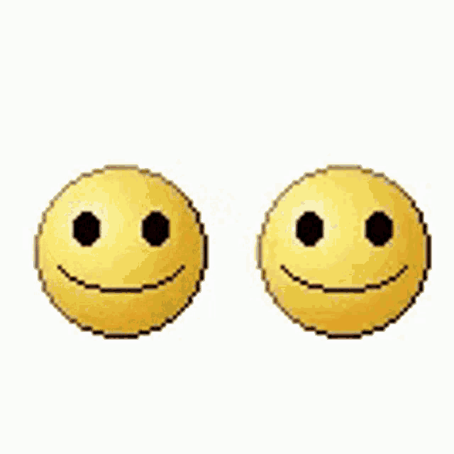 two yellow smiley faces are kissing each other with red hearts above them .