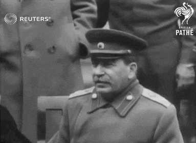 a black and white photo of a man in a military uniform with reuters written on the bottom right