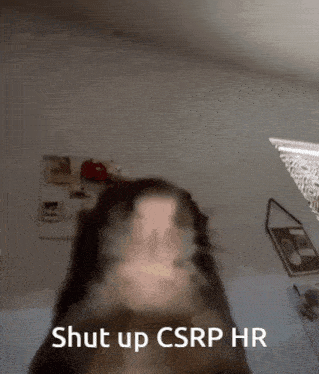 a blurry picture of a person with the words shut up csrp hr