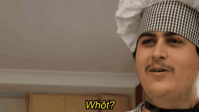 a man wearing a chef 's hat is asking the question " what "
