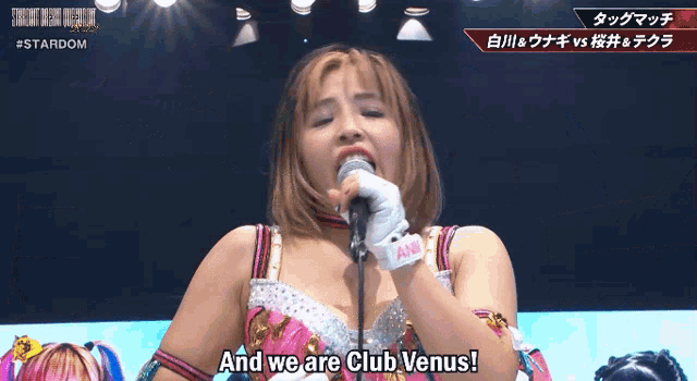 a woman singing into a microphone with the words " and we are club venus "