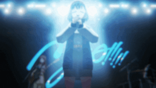 a blurry picture of a girl singing in front of a sign that says calligraphy
