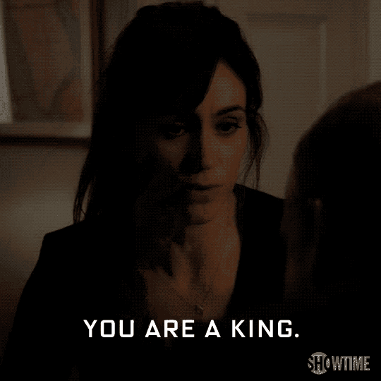 a woman in a dark room says you are a king