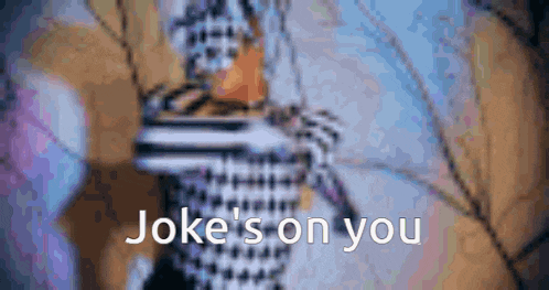 a blurry picture of a person with the words `` joke 's on you '' .