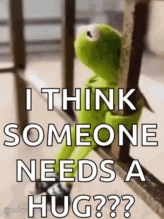 kermit the frog is sitting on a railing and says `` i think someone needs a hug ? '' .