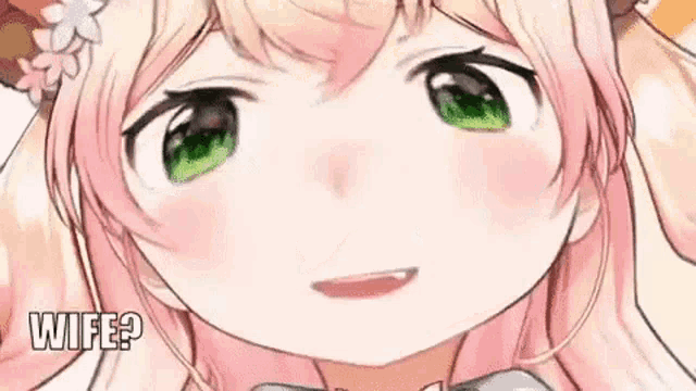 a close up of a pink anime girl with green eyes and a flower in her hair .
