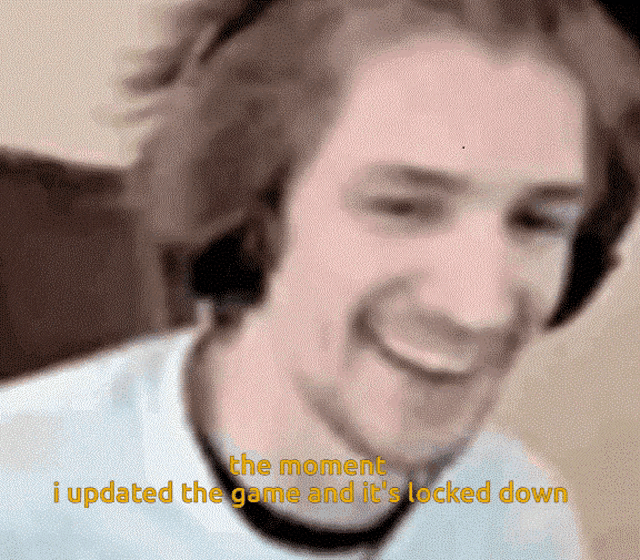 a blurry picture of a man with headphones and the words " the moment i updated the game and it 's locked down "