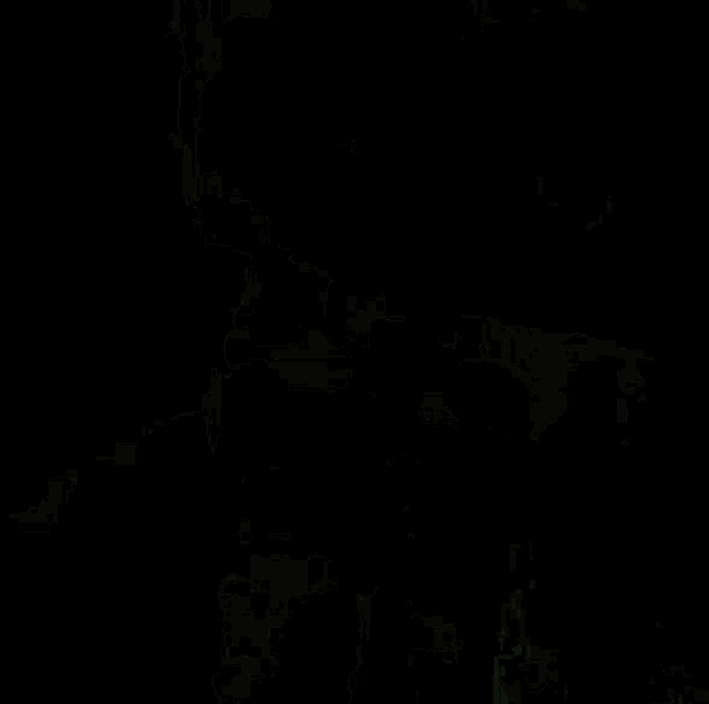 a dark background with a red and green colored texture