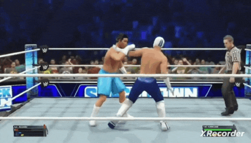 two men are fighting in a wrestling ring with the words xrecorder visible in the corner