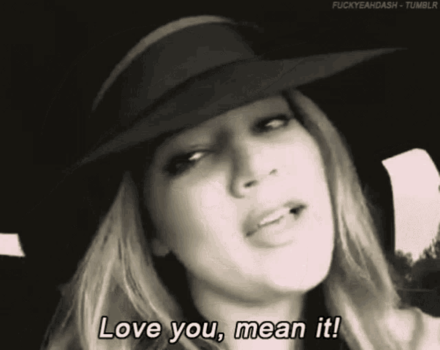 a woman wearing a hat is saying `` love you , mean it '' .