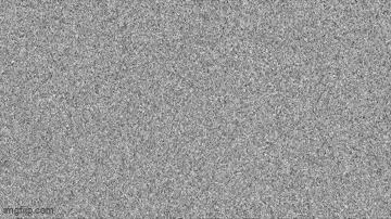 a gray carpet with a lot of small dots on it .