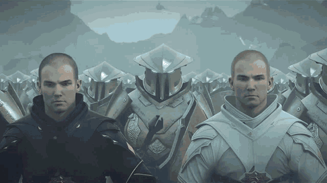 a group of men in armor are standing next to each other with mountains in the background
