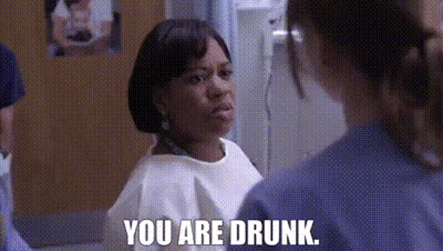 a woman in a hospital gown is talking to a nurse and the nurse says `` you are drunk '' .