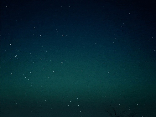 a dark blue sky with lots of stars