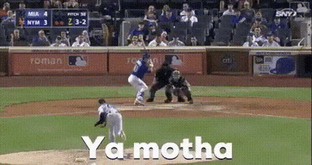 a baseball game is being played with the word ya motha in white