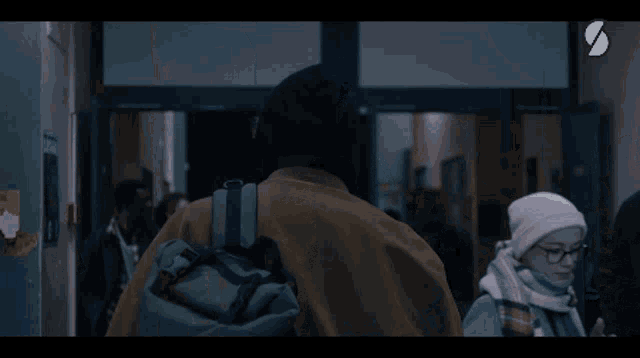 Eliott And Lucas Walking In The Hall Way GIF - Eliott And Lucas Walking In The Hall Way Look Back GIFs