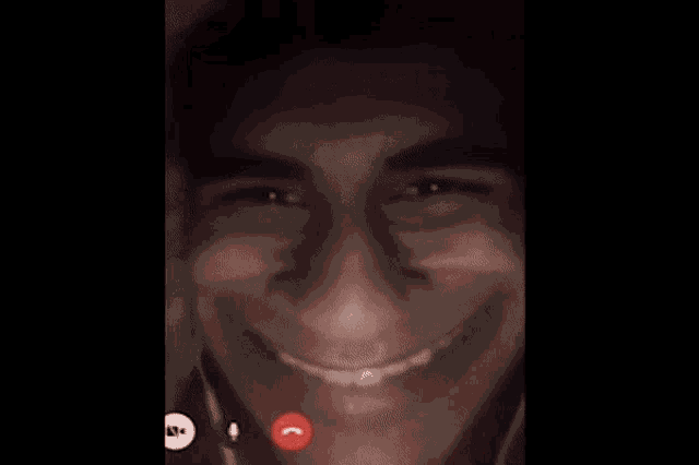 a phone screen with a red swirl and a red button that says " call "