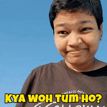 a woman wearing a t-shirt that says powerful move kya woh tum ho