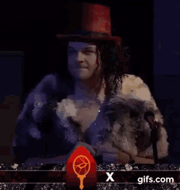 a man in a fur coat and top hat is saying vibe , i say .