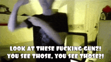 a man in a black shirt says look at these fucking gunz you see those you see those ?