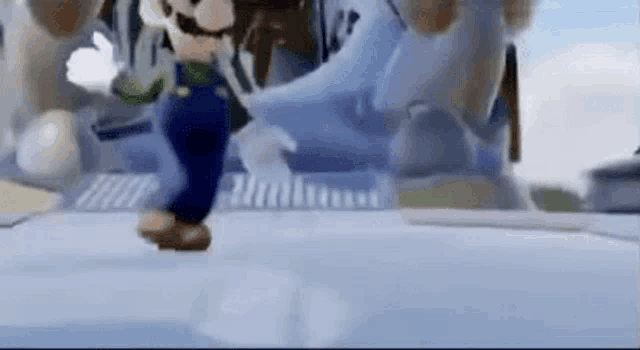 a close up of a cartoon character walking on a snowy surface .