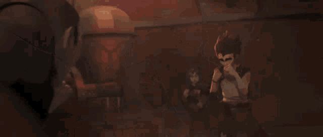 a man is laying on the ground with a fist in his face .