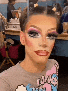a person with makeup on their face is wearing a shirt that says lynch