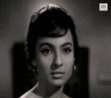 a woman 's face is shown in a black and white photo with a watermark that says ' medianet ' on it