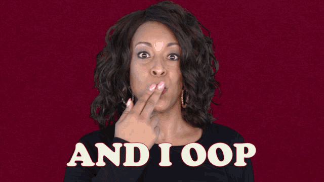 a woman with a surprised look on her face is standing in front of a sign that says " and i oop "