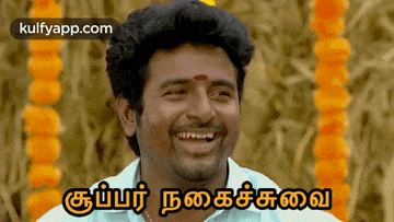 a man in a white shirt is smiling with the words kulfyapp.com above him