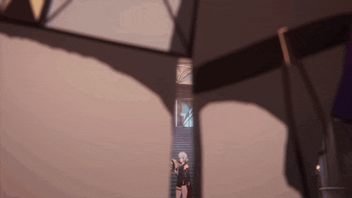 a woman is standing in front of a staircase in a room .