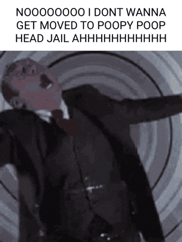 a picture of a man in a suit and tie with a caption that says nooooo i dont wanna