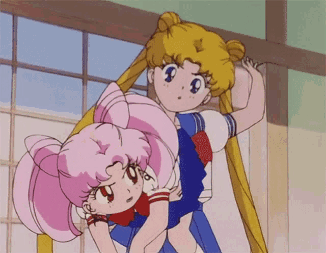 a cartoon of a girl holding another girl in her arms