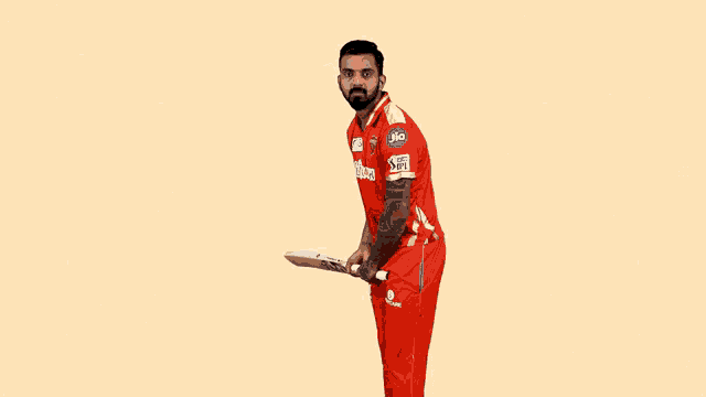 a man wearing a red jersey that says litecash
