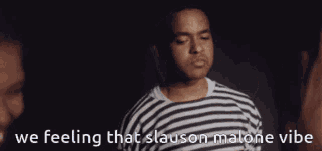 a man in a striped shirt says we feeling that slaason malone vibe