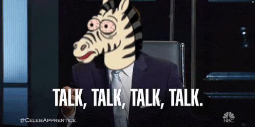 a man in a suit and tie with a zebra head on his face says talk talk talk talk
