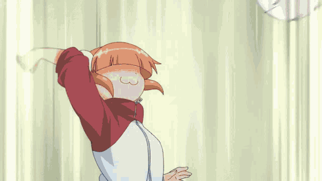 a girl is jumping in the air to catch a volleyball while playing volleyball