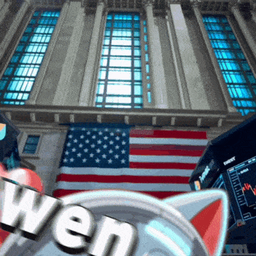 a cat 's ears are visible in front of an american flag and the word wen