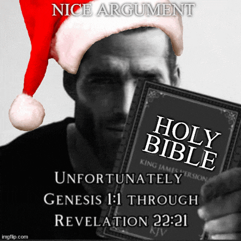 a man wearing a santa hat is holding a bible