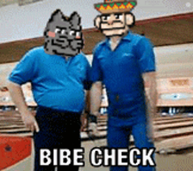 two men are standing next to each other in a bowling alley and one of them is wearing a sombrero and sunglasses .