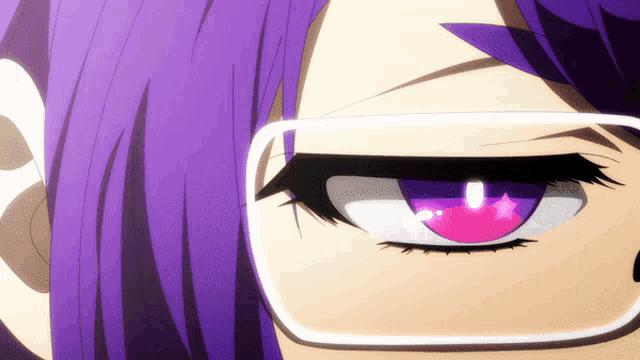 a close up of a person 's eye with purple hair