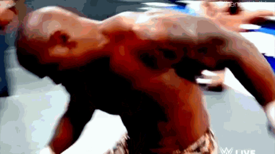 a man 's back is shown in a pixelated image with the letters w live on the bottom right