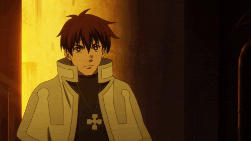 a man with red hair and a cross on his neck