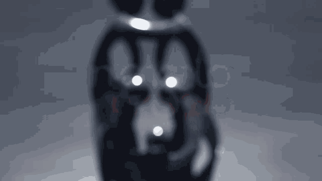 a blurred image of a person 's face with the word castro in red