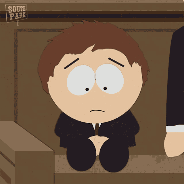 a south park character sits in a box