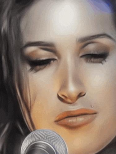 a close up of a woman 's face looking at a microphone