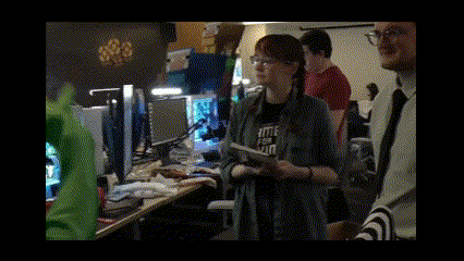 a woman wearing a shirt that says " it 's a wrap "